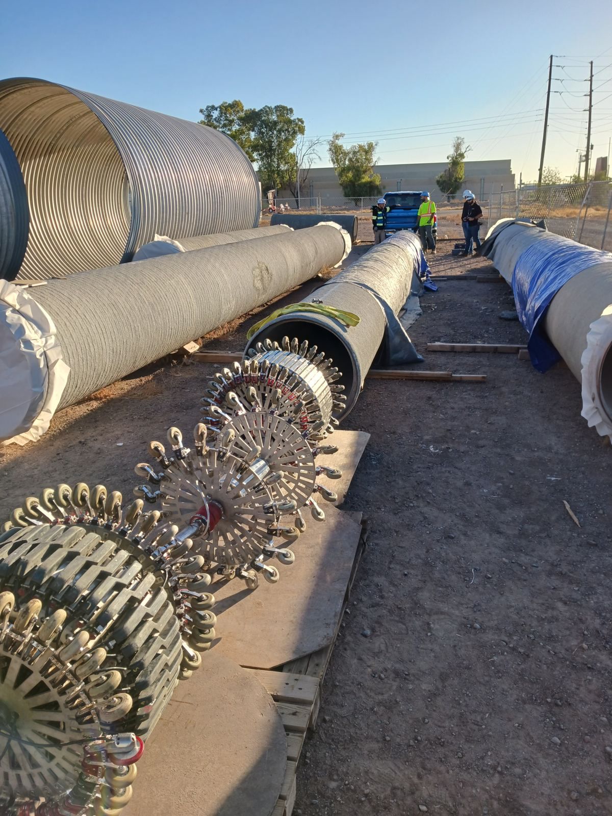 Inspection tools and pipe sections laid out at a verification test site